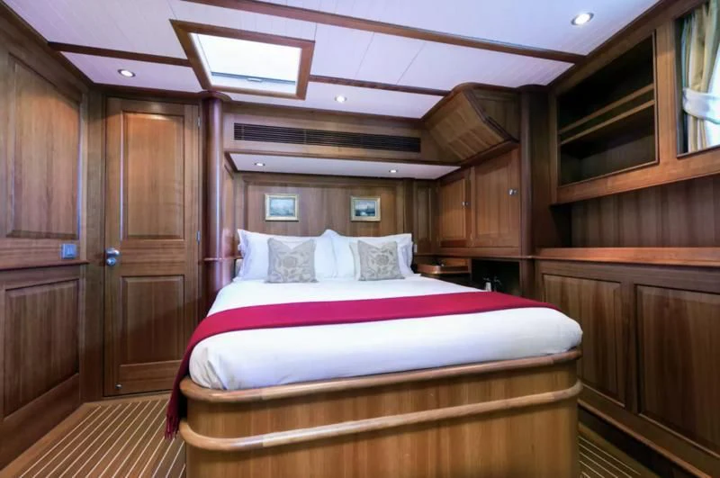 a bed in a cabin aboard PITUXIN VI Yacht for Sale