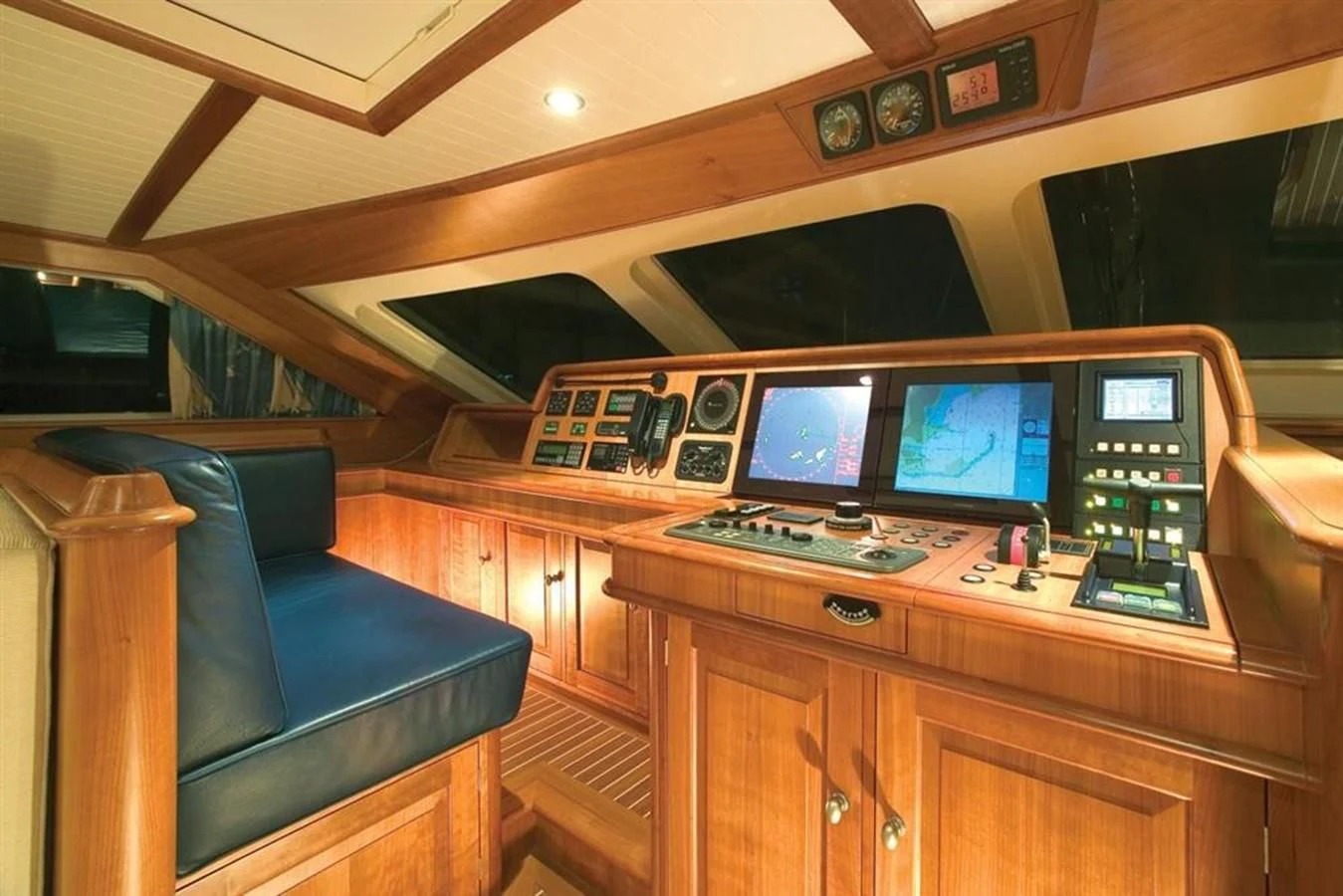 a room with a desk and a chair and a computer aboard PITUXIN VI Yacht for Sale
