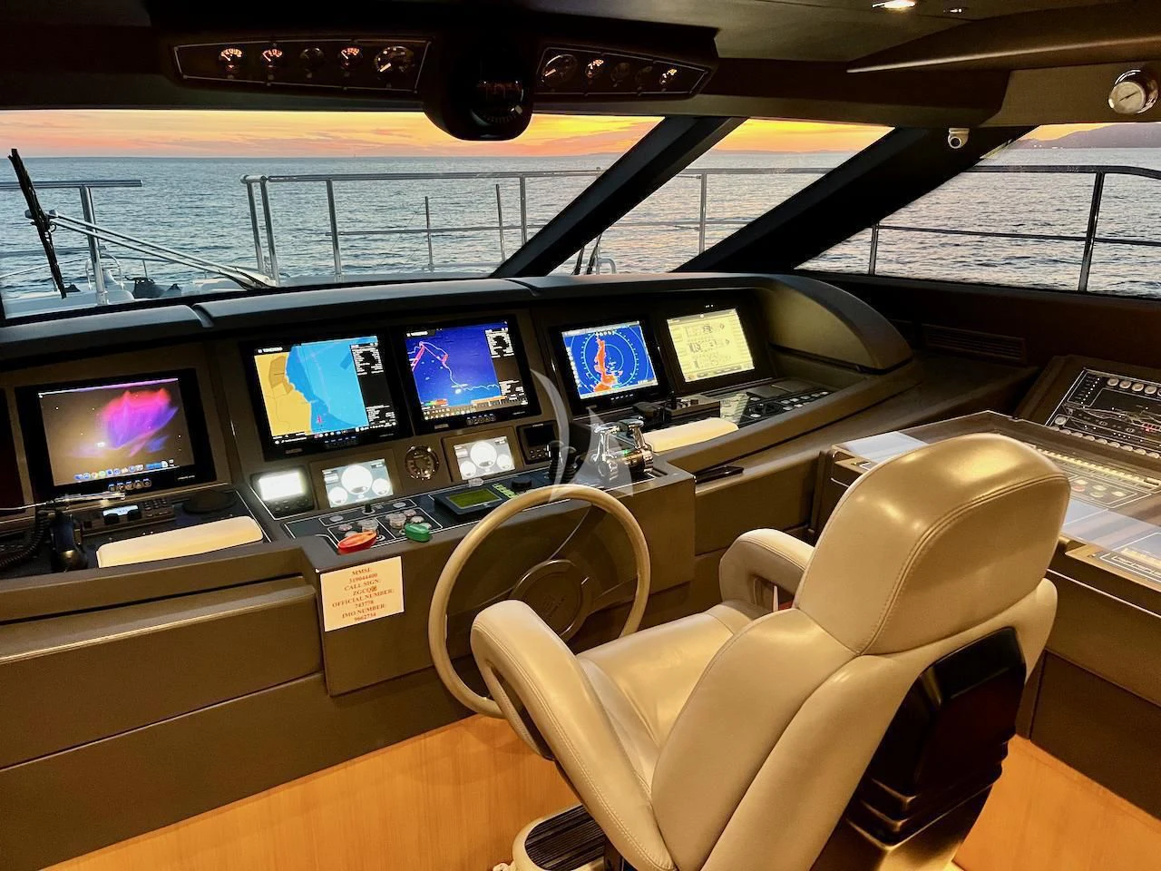 a room with many monitors aboard NIKO III Yacht for Charter