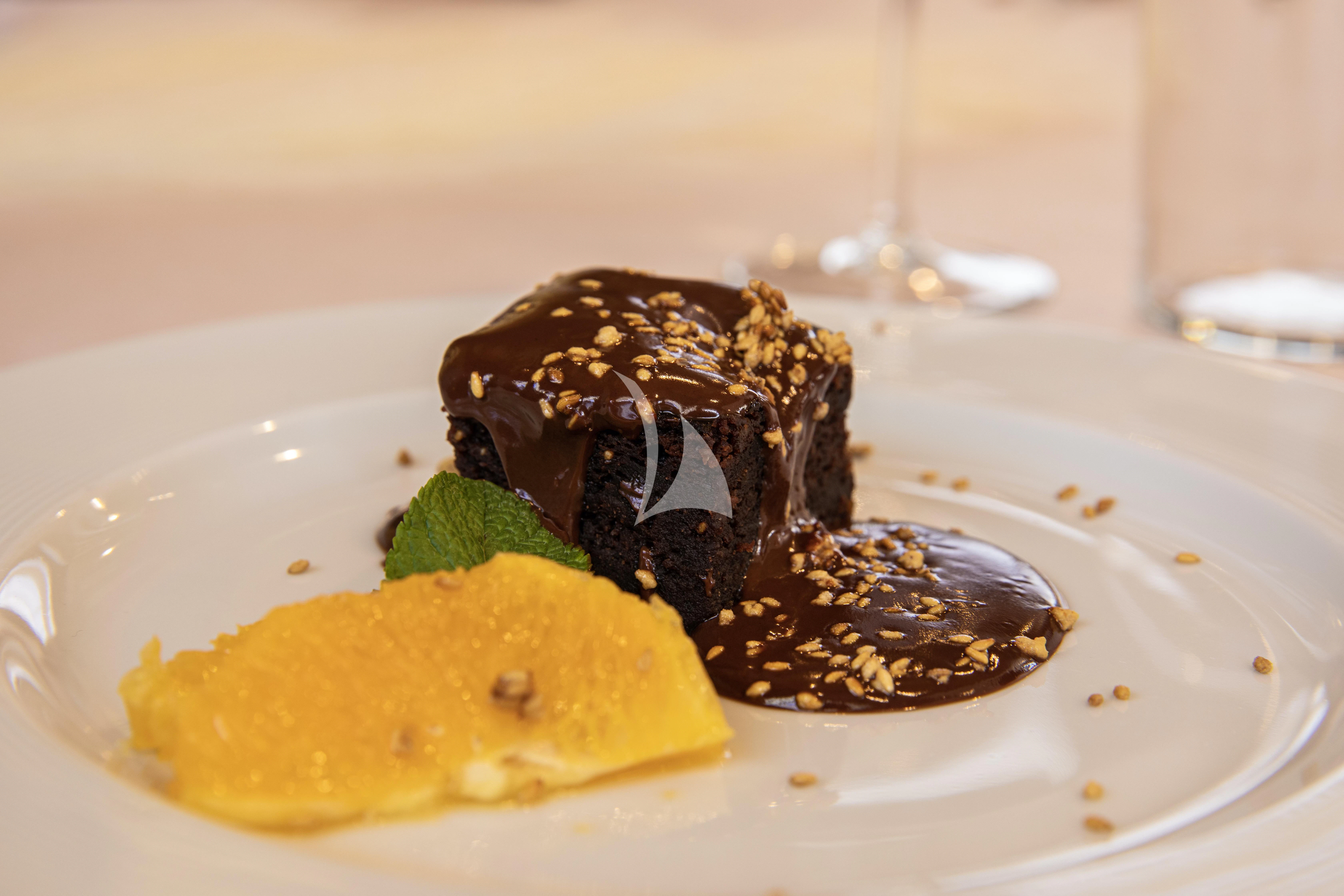 a plate of food aboard NIKO III Yacht for Charter