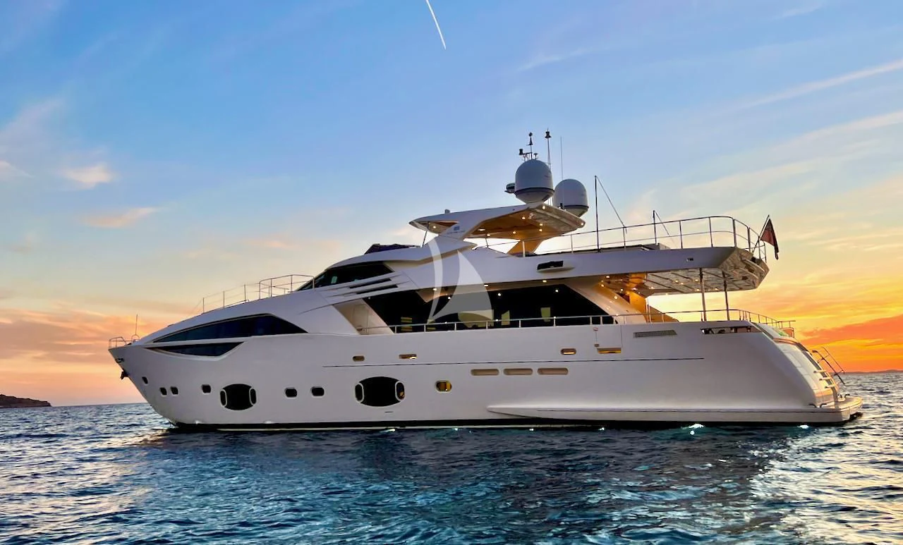 a white yacht on the water aboard NIKO III Yacht for Charter