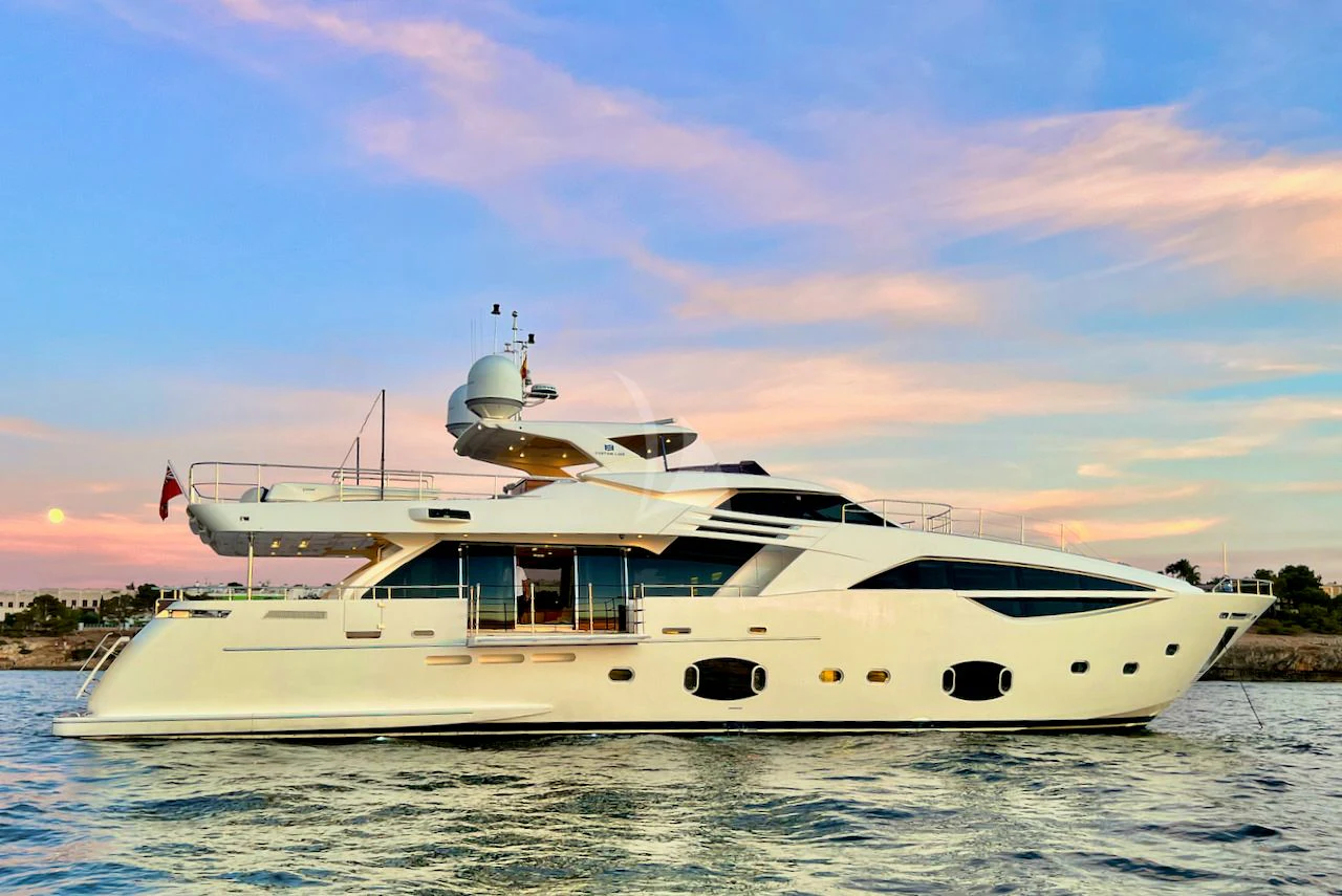 a white yacht on the water aboard NIKO III Yacht for Charter