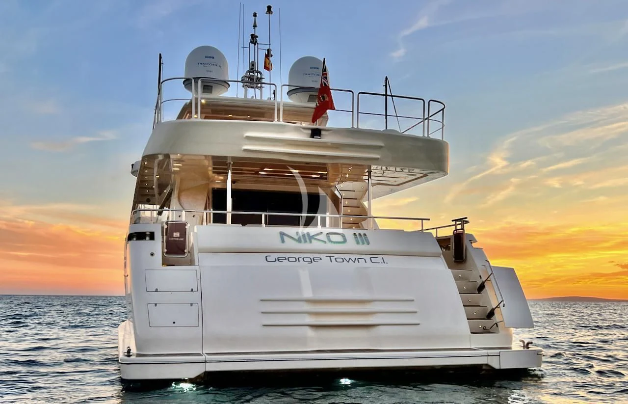 a large white ship in the water aboard NIKO III Yacht for Charter