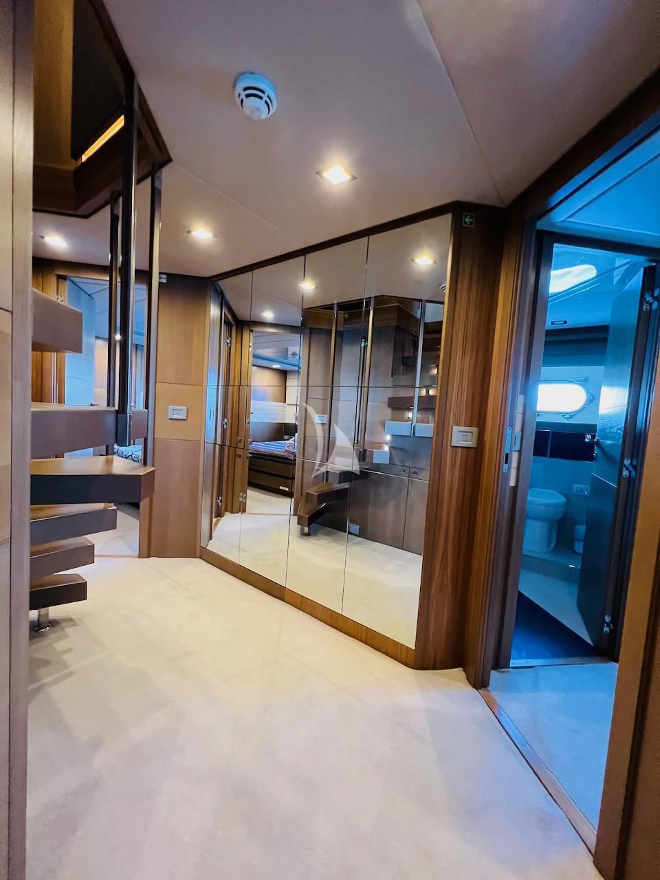 a large bathroom with a glass shower aboard NIKO III Yacht for Charter