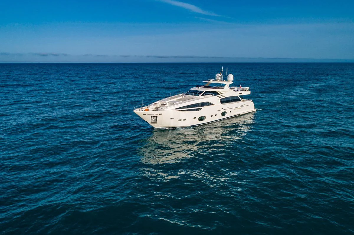 a white yacht in the water aboard NIKO III Yacht for Charter