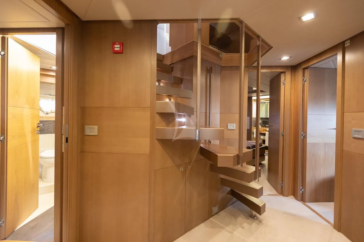 a room with a large closet aboard NIKO III Yacht for Charter