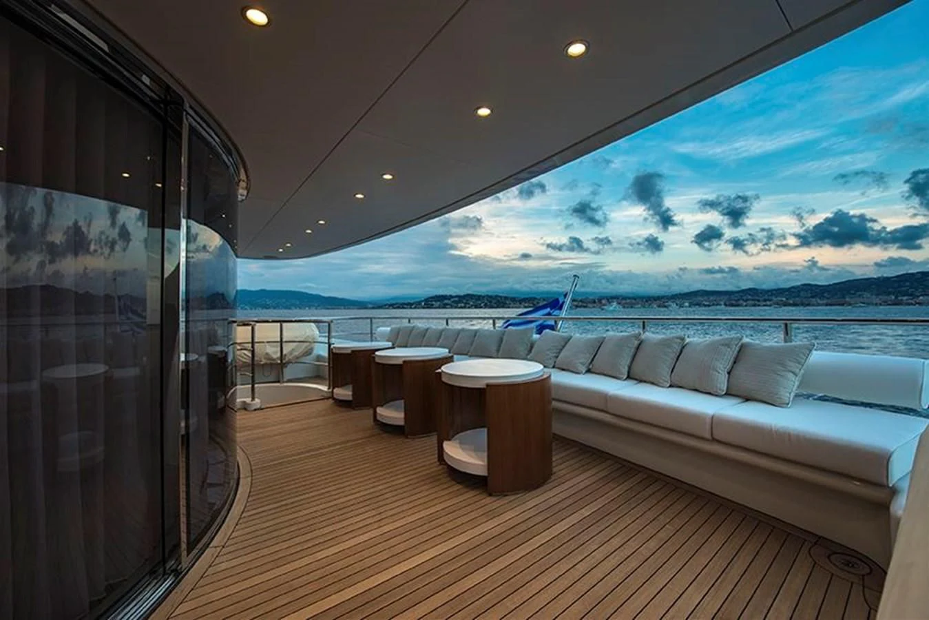 a large living room with a view of the ocean aboard DARLING Yacht for Sale