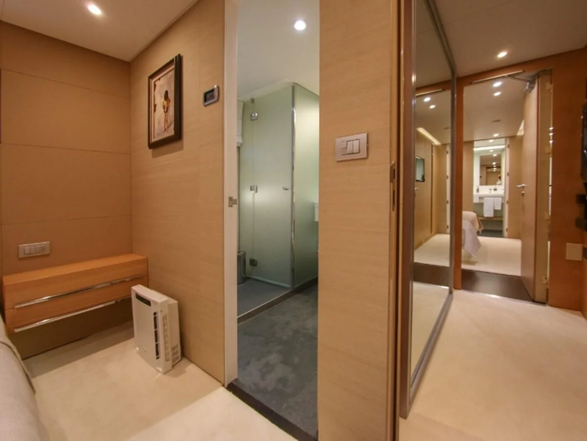 a bathroom with a glass shower aboard DARLING Yacht for Sale