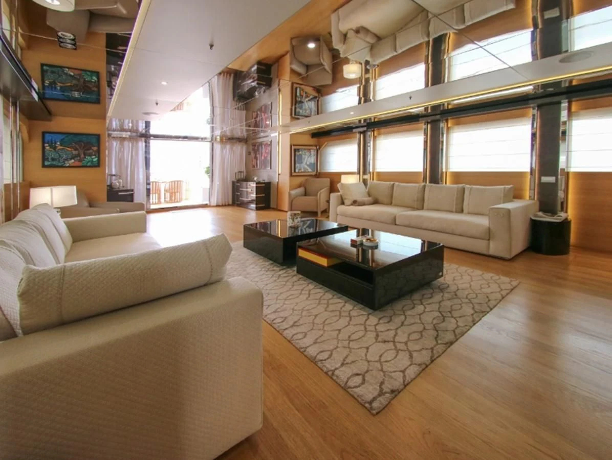 a living room with a large window aboard DARLING Yacht for Sale