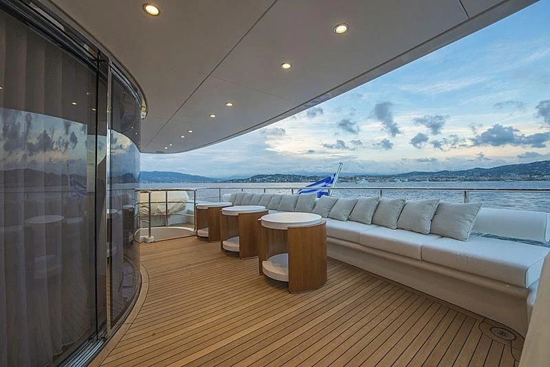 a room with a couch and a view of the water aboard DARLING Yacht for Sale
