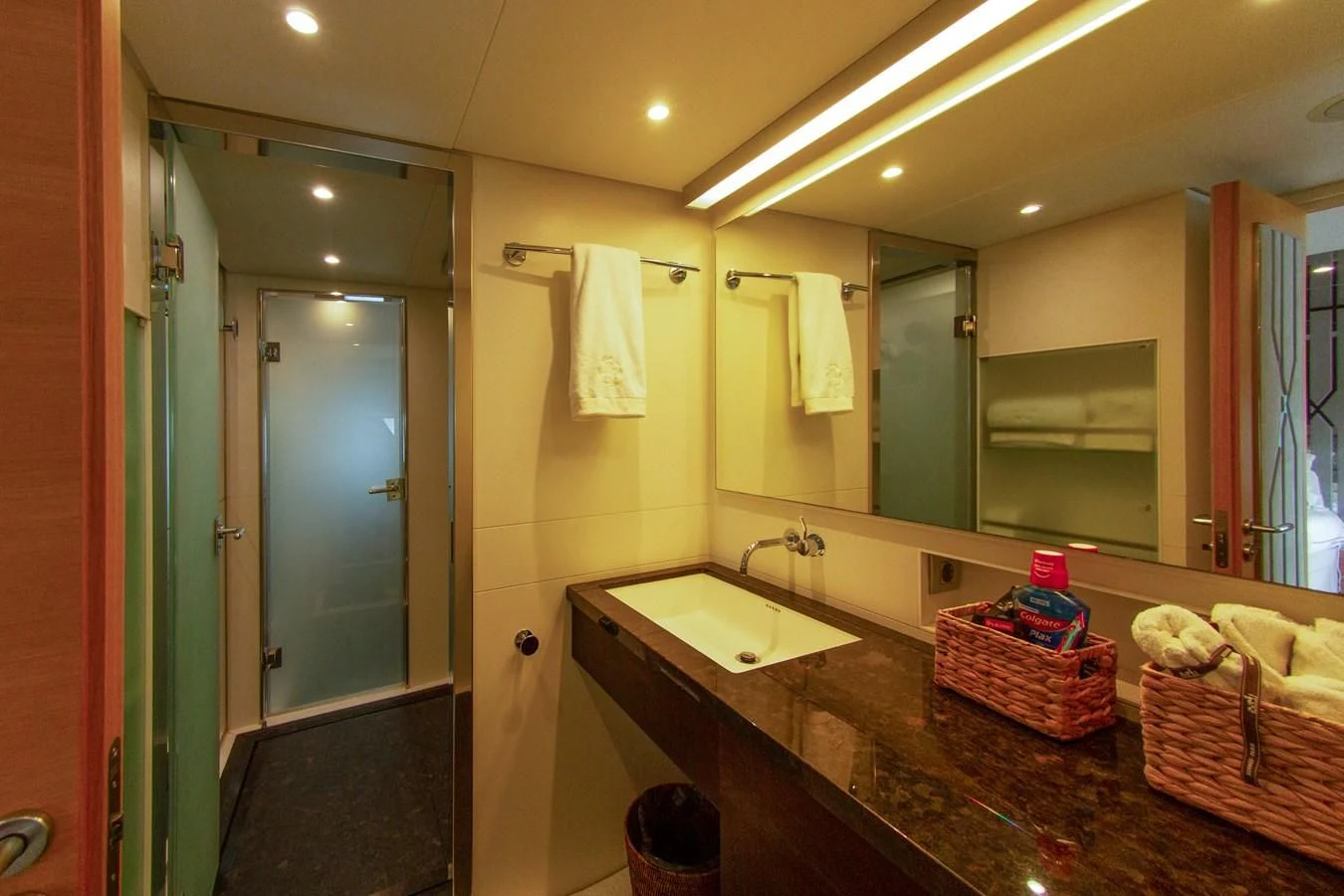 a bathroom with a countertop sink and mirror aboard DARLING Yacht for Sale