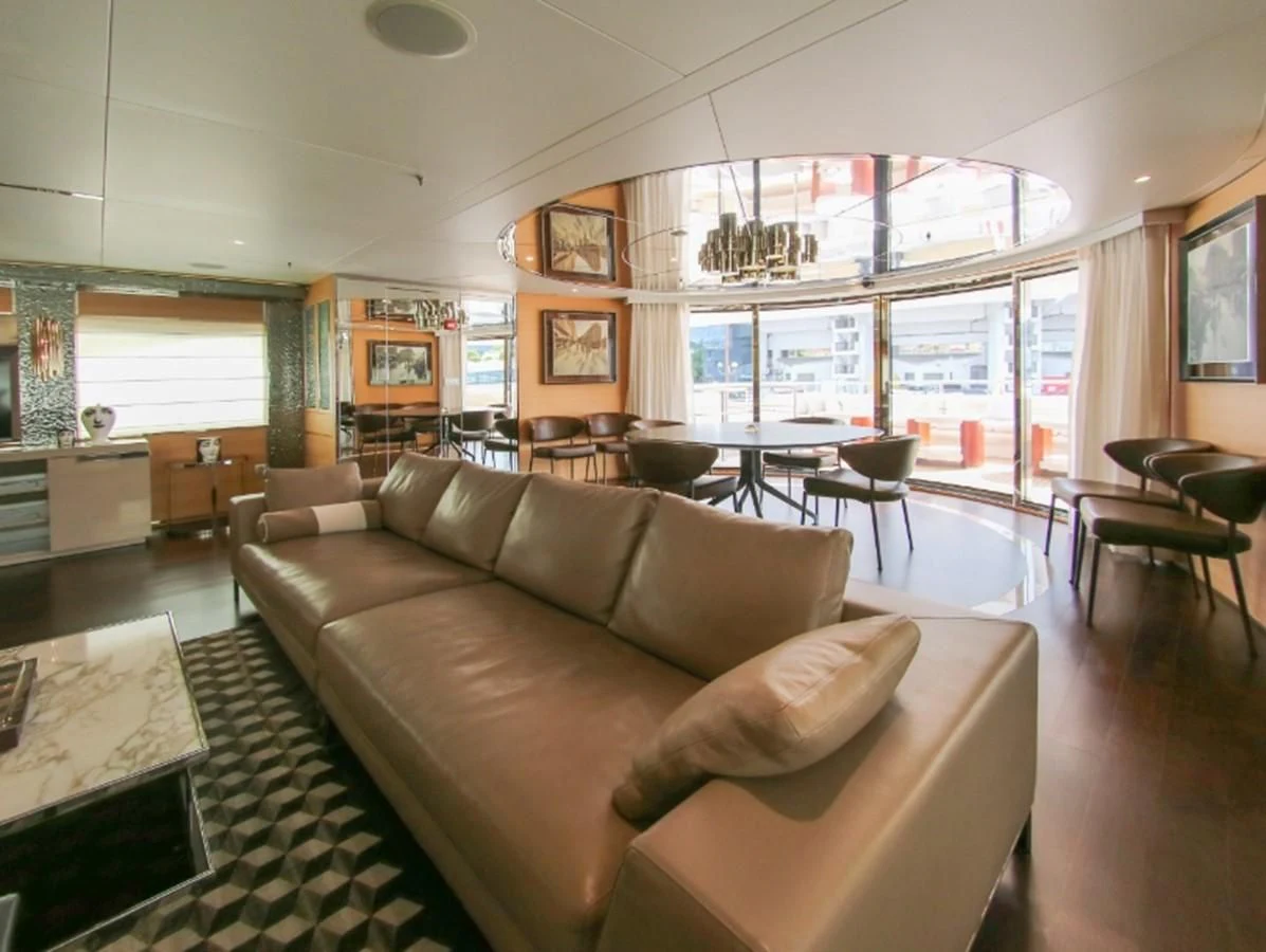 a living room with a large window aboard DARLING Yacht for Sale