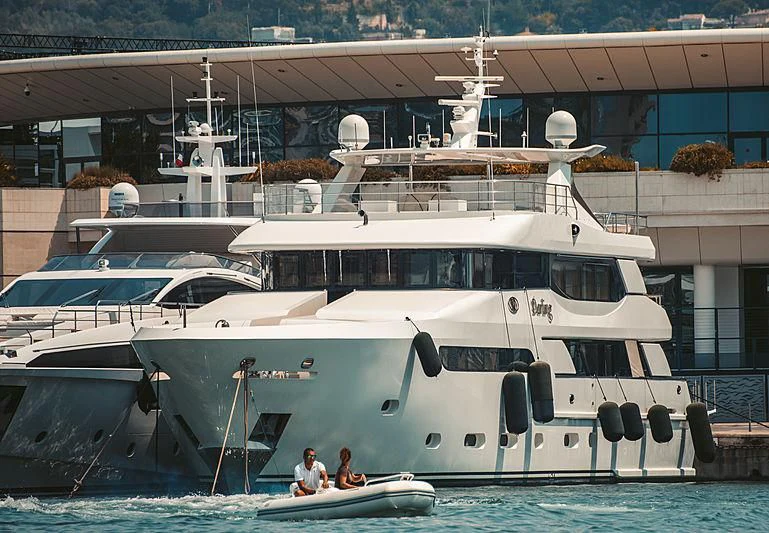 a boat is parked in the water aboard DARLING Yacht for Sale