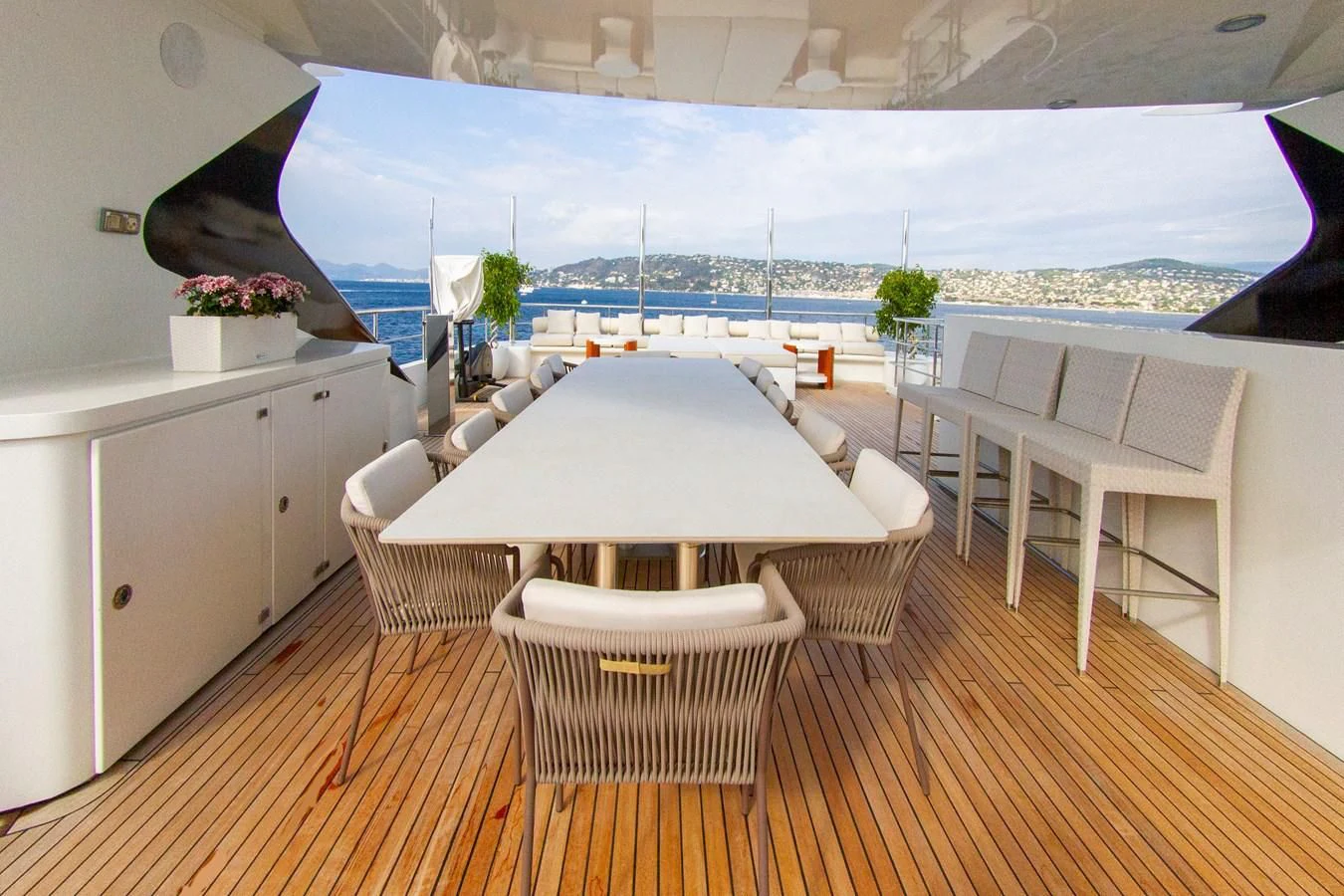 a room with a table and chairs aboard DARLING Yacht for Sale