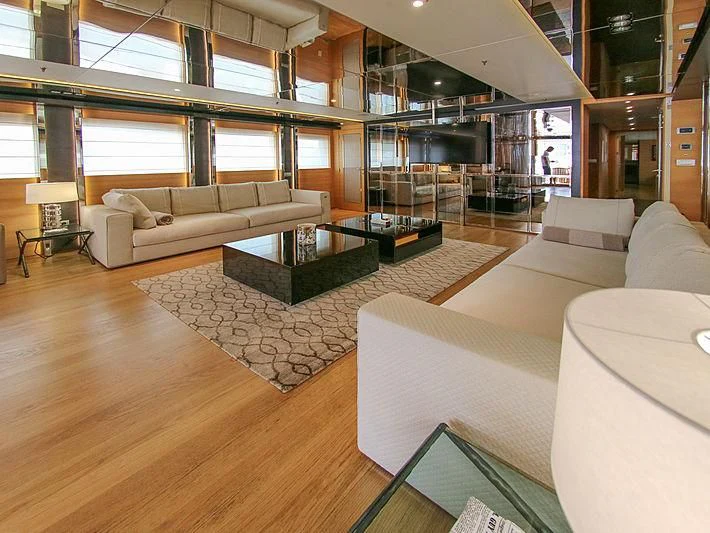 a living room with a large glass window aboard DARLING Yacht for Sale
