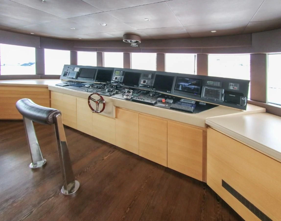 a kitchen with a stool aboard DARLING Yacht for Sale