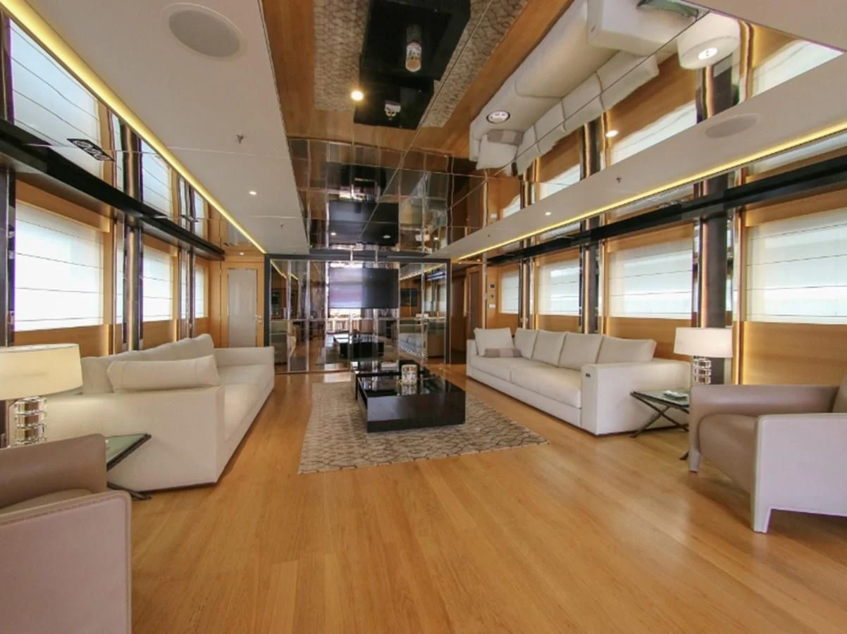 a room with a couch and a table aboard DARLING Yacht for Sale