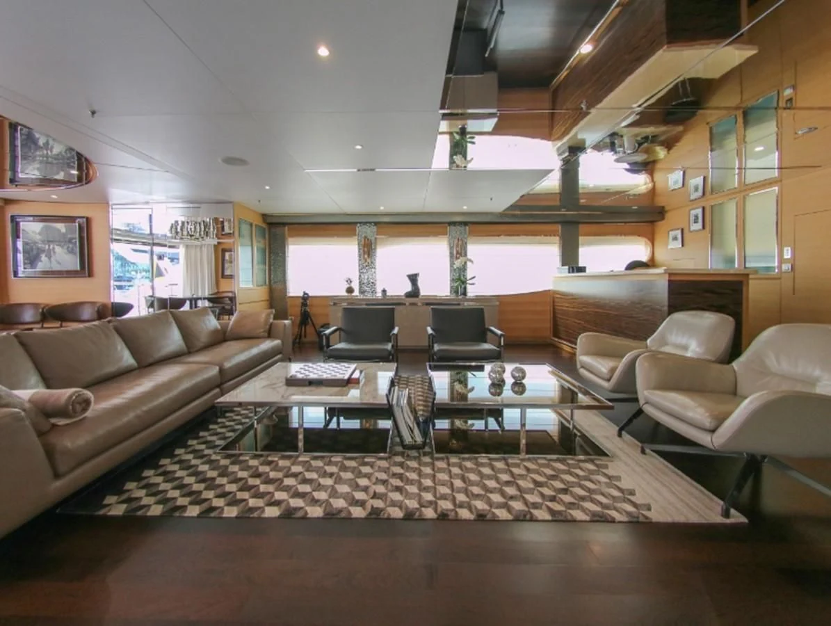 a living room with a large glass window aboard DARLING Yacht for Sale