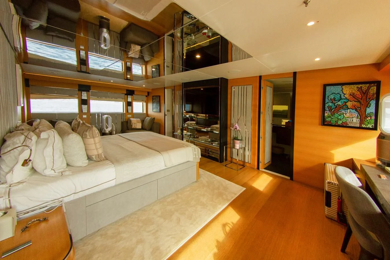 a living room with a large mirror aboard DARLING Yacht for Sale