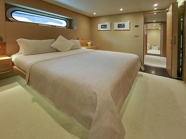 a hotel room with a bed aboard DARLING Yacht for Sale