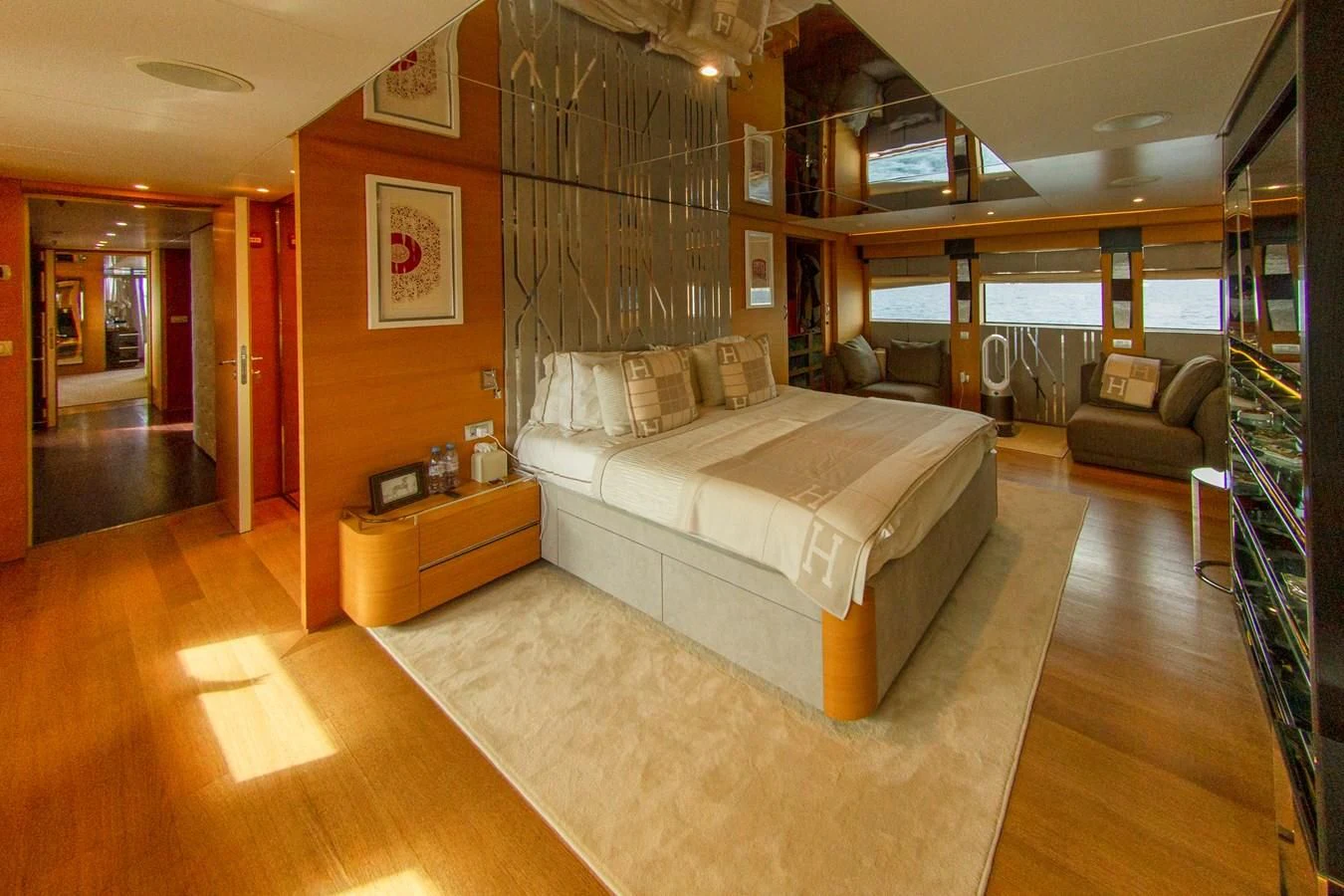 a living room with a staircase aboard DARLING Yacht for Sale