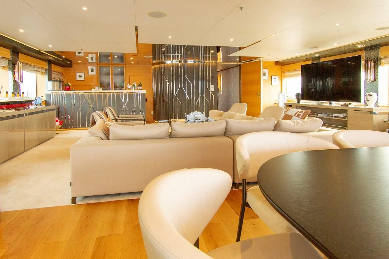 a living room with a large window aboard DARLING Yacht for Sale