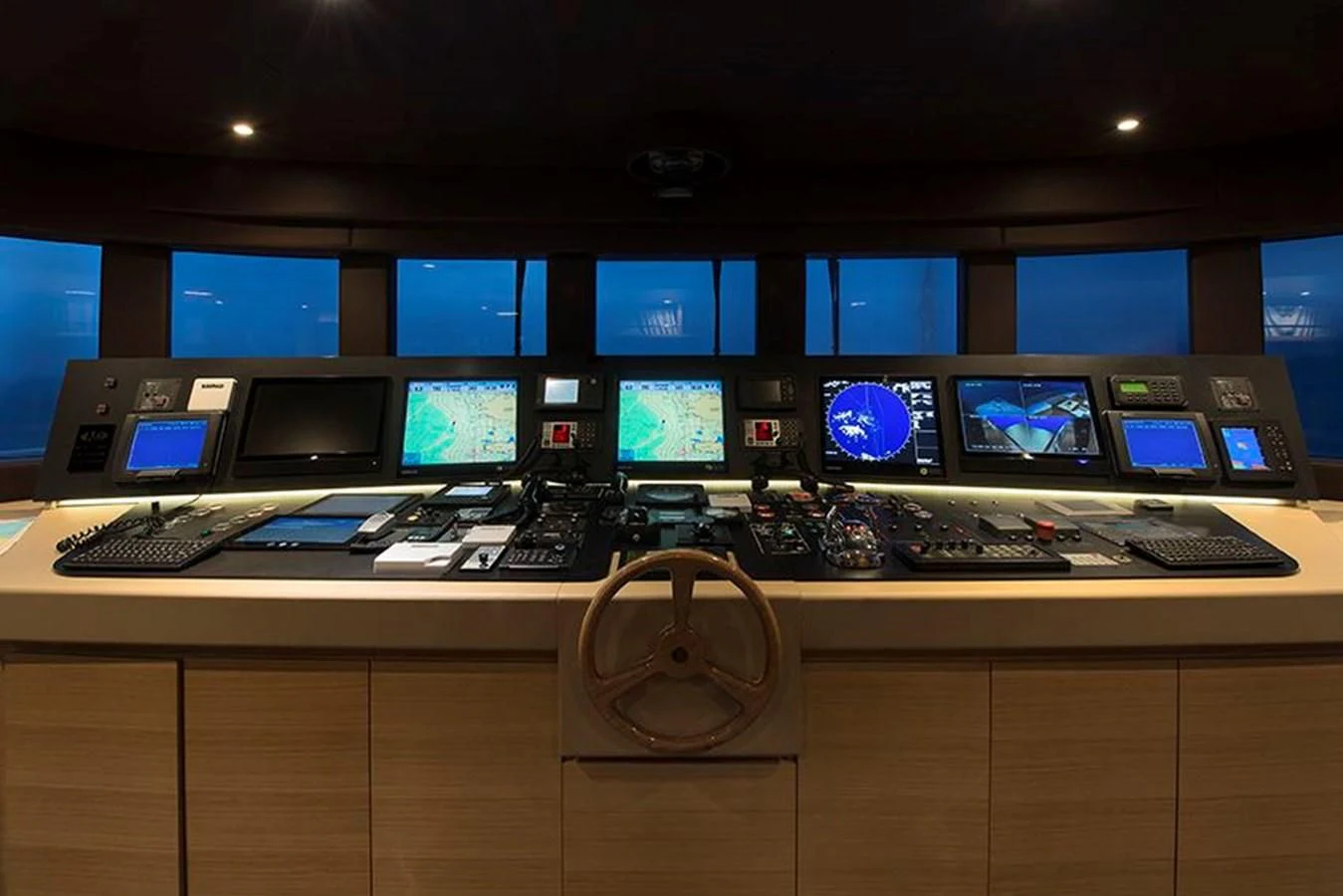 a room with many monitors and keyboards aboard DARLING Yacht for Sale