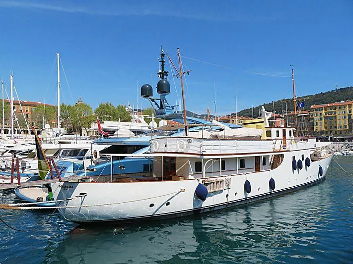 several boats docked in a harbor aboard DEIANEIRA Yacht for Sale