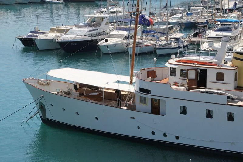 a group of boats in a harbor aboard DEIANEIRA Yacht for Sale