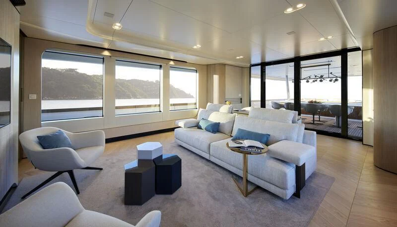a living room with a large window aboard LL Yacht for Sale