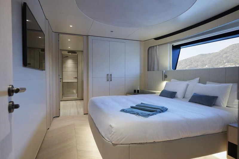 a bed in a room aboard LL Yacht for Sale