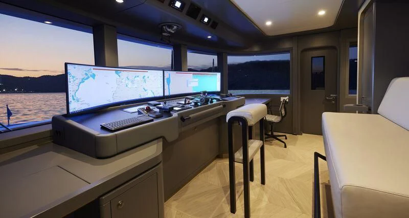 a room with a large window and a large white computer on a boat aboard LL Yacht for Sale