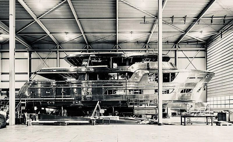 a large airplane in a hangar aboard LL Yacht for Sale