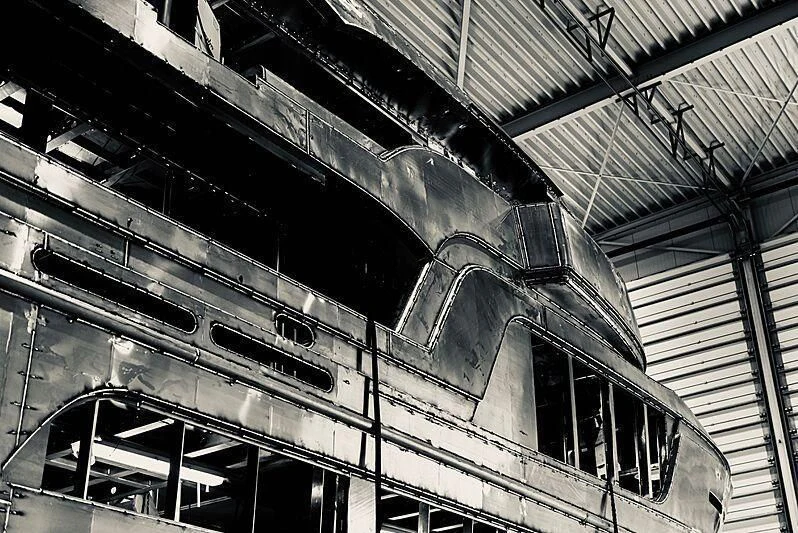 a large building with many windows aboard LL Yacht for Sale