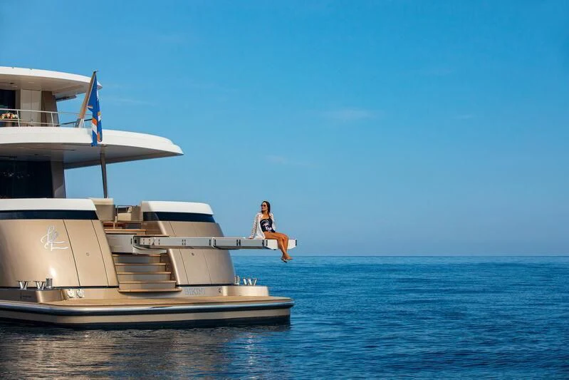 a person sitting on a boat aboard LL Yacht for Sale