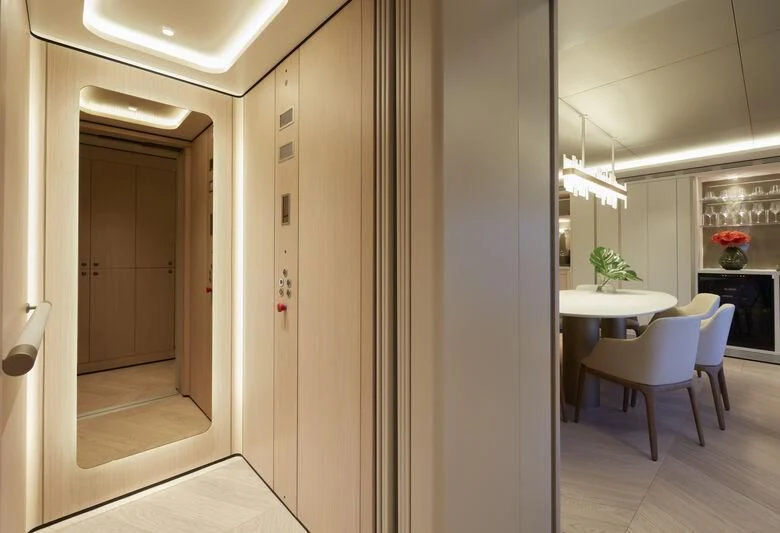 a room with a table and chairs aboard LL Yacht for Sale