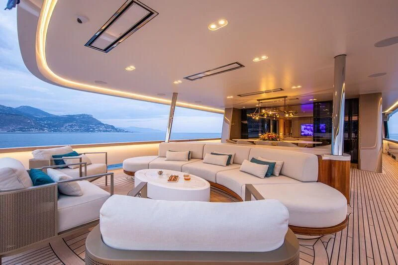 a living room with a large window aboard LL Yacht for Sale