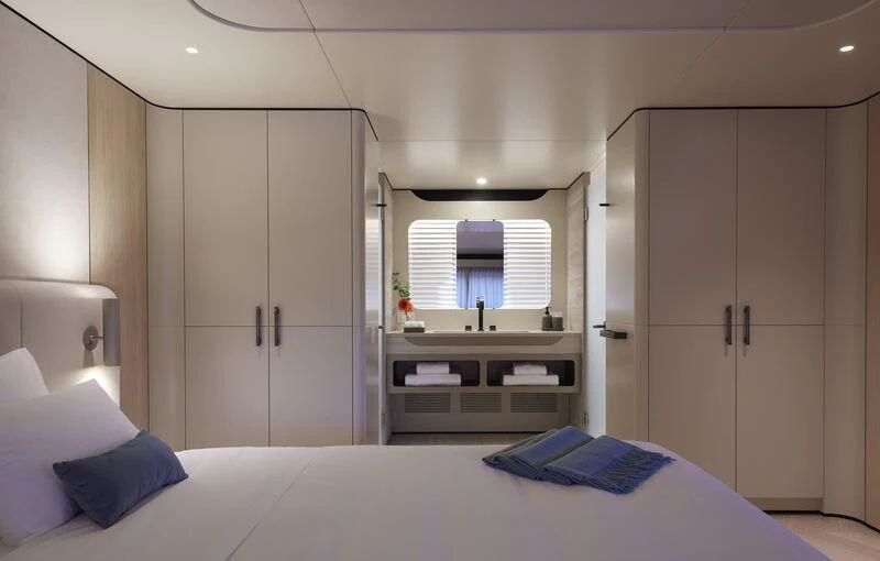 a bed in a room aboard LL Yacht for Sale