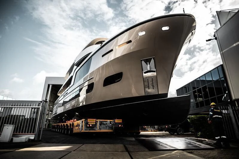 a large black and white helicopter aboard LL Yacht for Sale