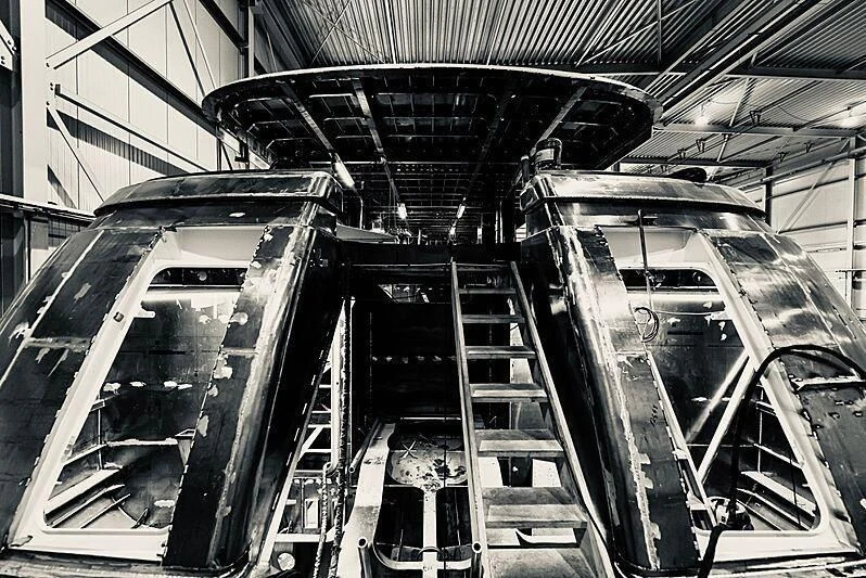 a large metal structure with several staircases aboard LL Yacht for Sale
