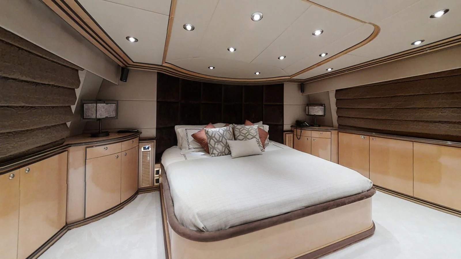 a large bedroom with a large bed aboard ENTOURAGE Yacht for Sale
