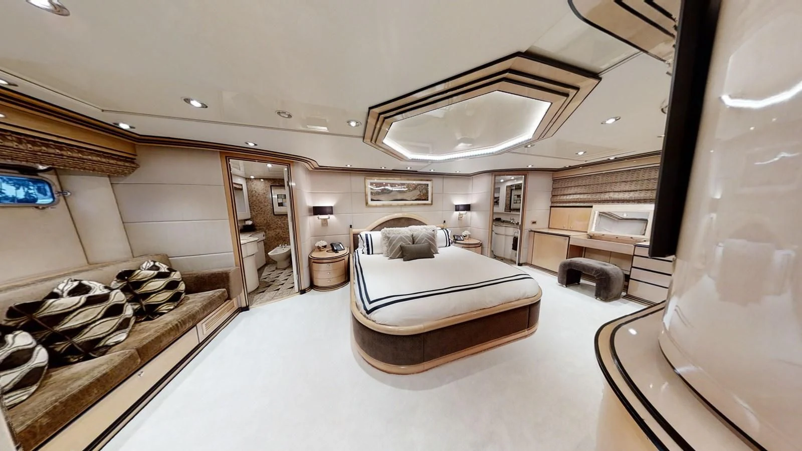 a room with a bed and a desk aboard ENTOURAGE Yacht for Sale