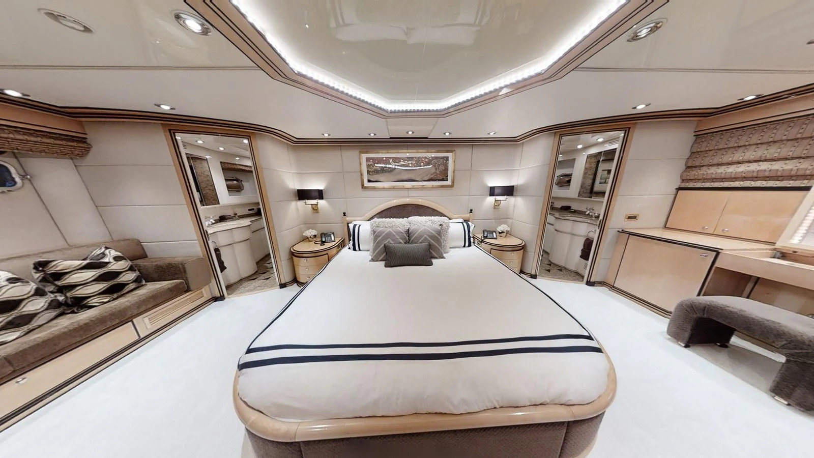 a room with a bed and a desk aboard ENTOURAGE Yacht for Sale