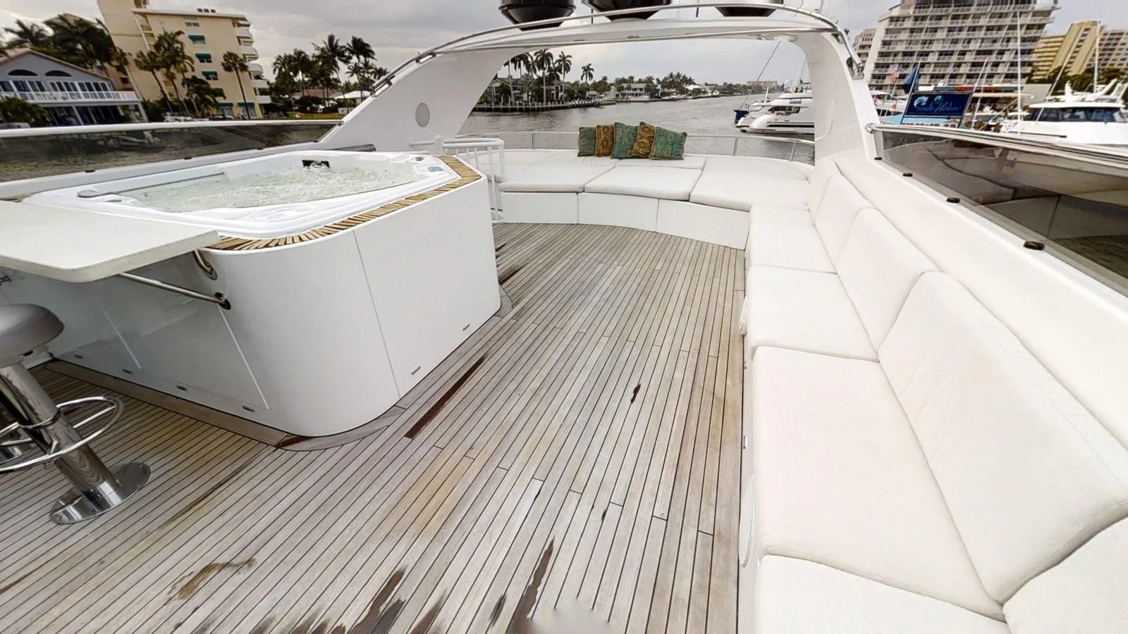 a deck with white boats aboard ENTOURAGE Yacht for Sale