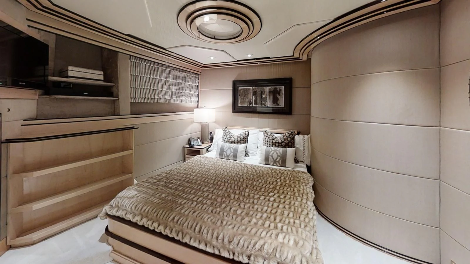 a room with a bed and a mirror aboard ENTOURAGE Yacht for Sale