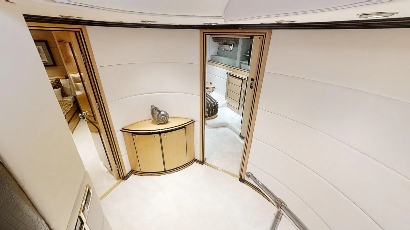 a room with a table and a mirror aboard ENTOURAGE Yacht for Sale