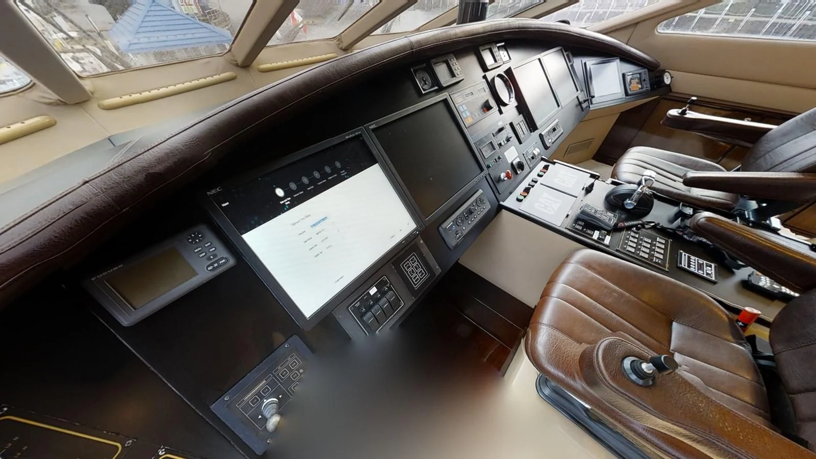 a machine with a screen aboard ENTOURAGE Yacht for Sale