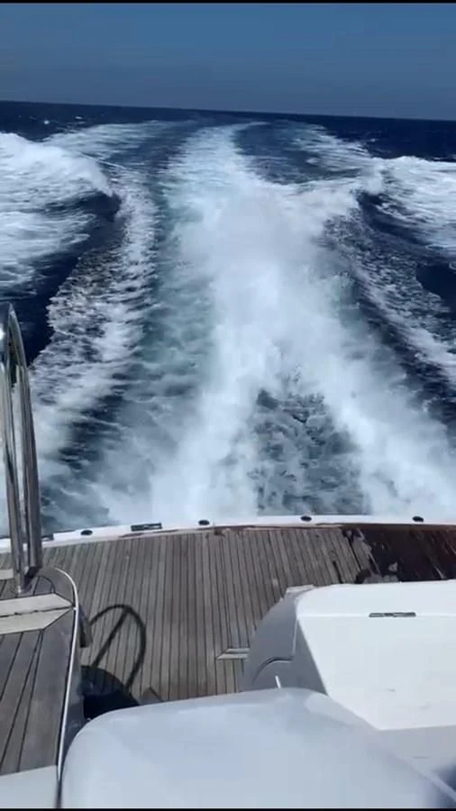 a large wave crashing aboard ENTOURAGE Yacht for Sale