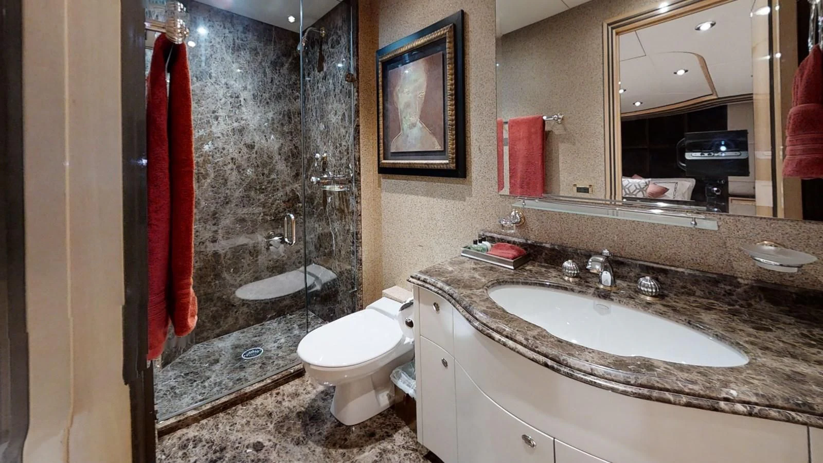 a bathroom with a sink and a toilet aboard ENTOURAGE Yacht for Sale