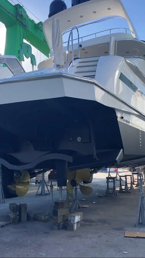 a large white boat with a large propeller aboard ENTOURAGE Yacht for Sale